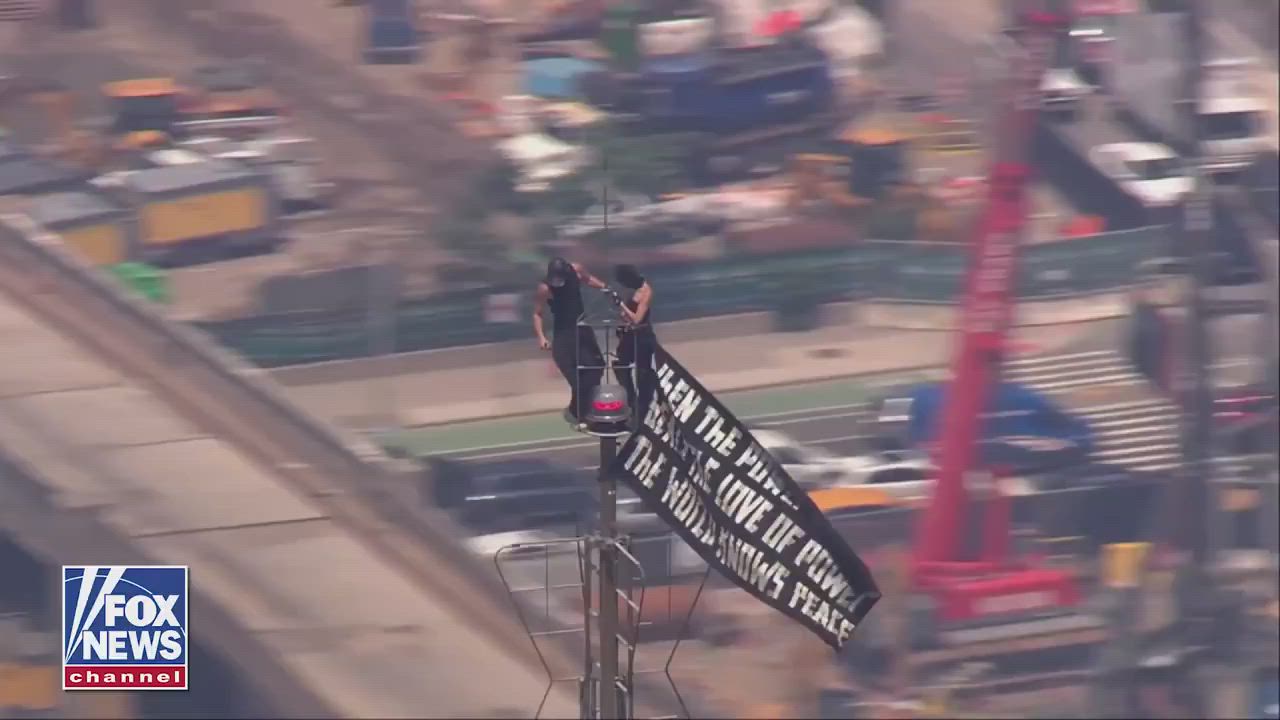 World news: A couple climbed the Empire State Building’s in the USA 1,454-foot spire after proposing...