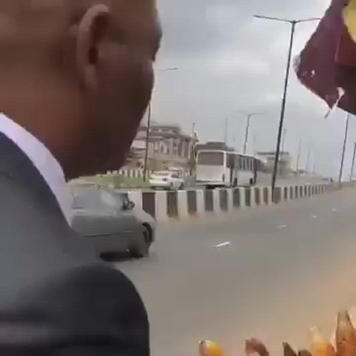 Billionaire Tony Elumelu spotted buying roasted corn from roadside vendor