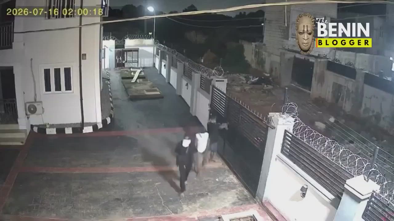CCTV reportedly captures about 15 armed men attempting to force entry into several apartments along...