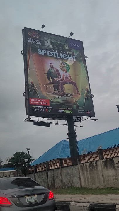 On my way to work this morning, I saw this billboard signaling the return of #BBNaija and I can't he...