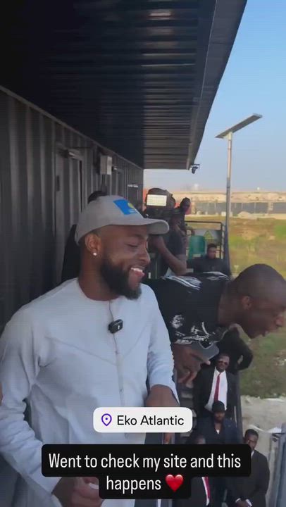 Davido went to check on his building project today and the workers cheered him